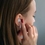 airpods connected in someones ear